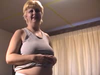 Blonde granny enjoying animal sex toy dog cock